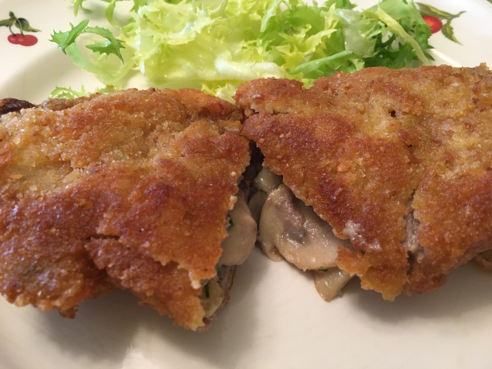 Fil. de ternera empanado relleno de setas