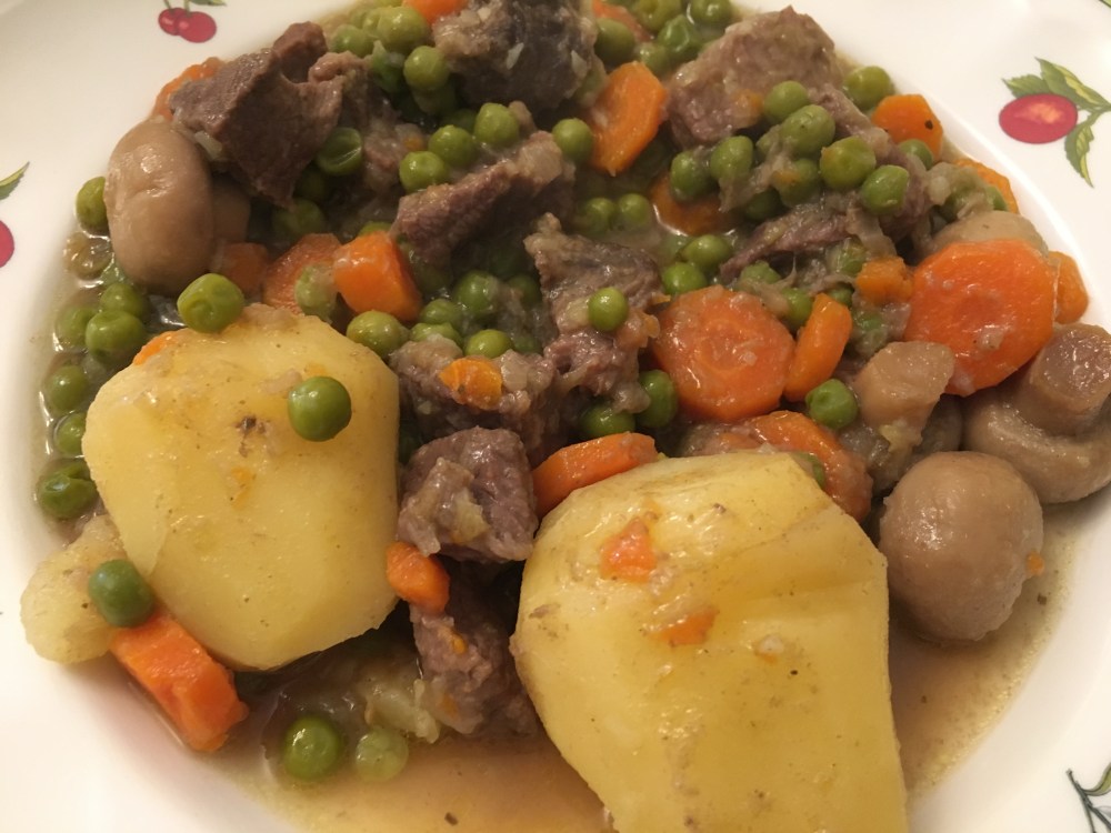 ternera-con-champis-y-guisantes